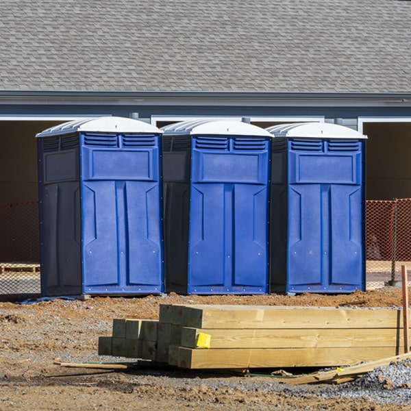 what is the cost difference between standard and deluxe porta potty rentals in Yakima